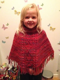 Knitted children's poncho