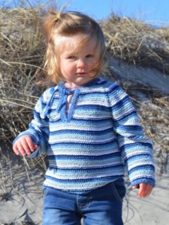 Striped children's sweater with lacing