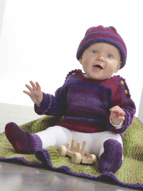 Knitted sweater, hat, socks and blanket