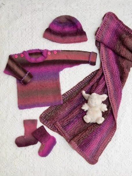 Knitted sweater, hat, socks and blanket