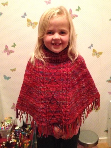 Knitted children's poncho
