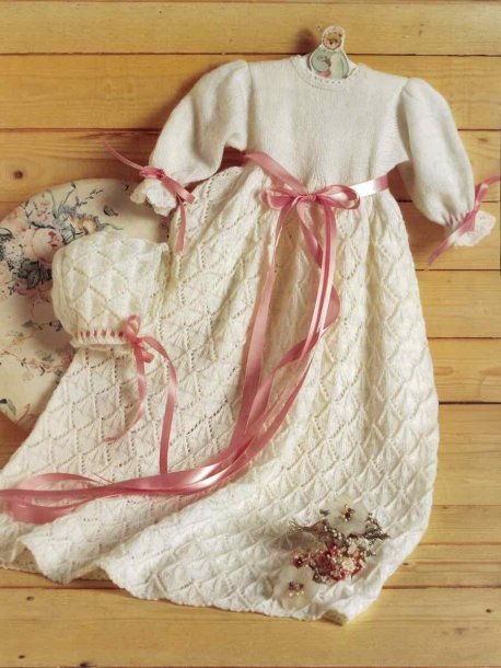 Knitted christening dress and hat